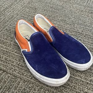 Orange & blue slip on vans